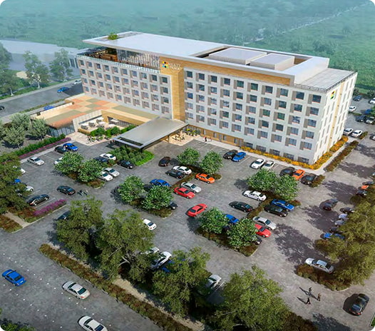 Aerial view of the six-story Hyatt Place hotel and site